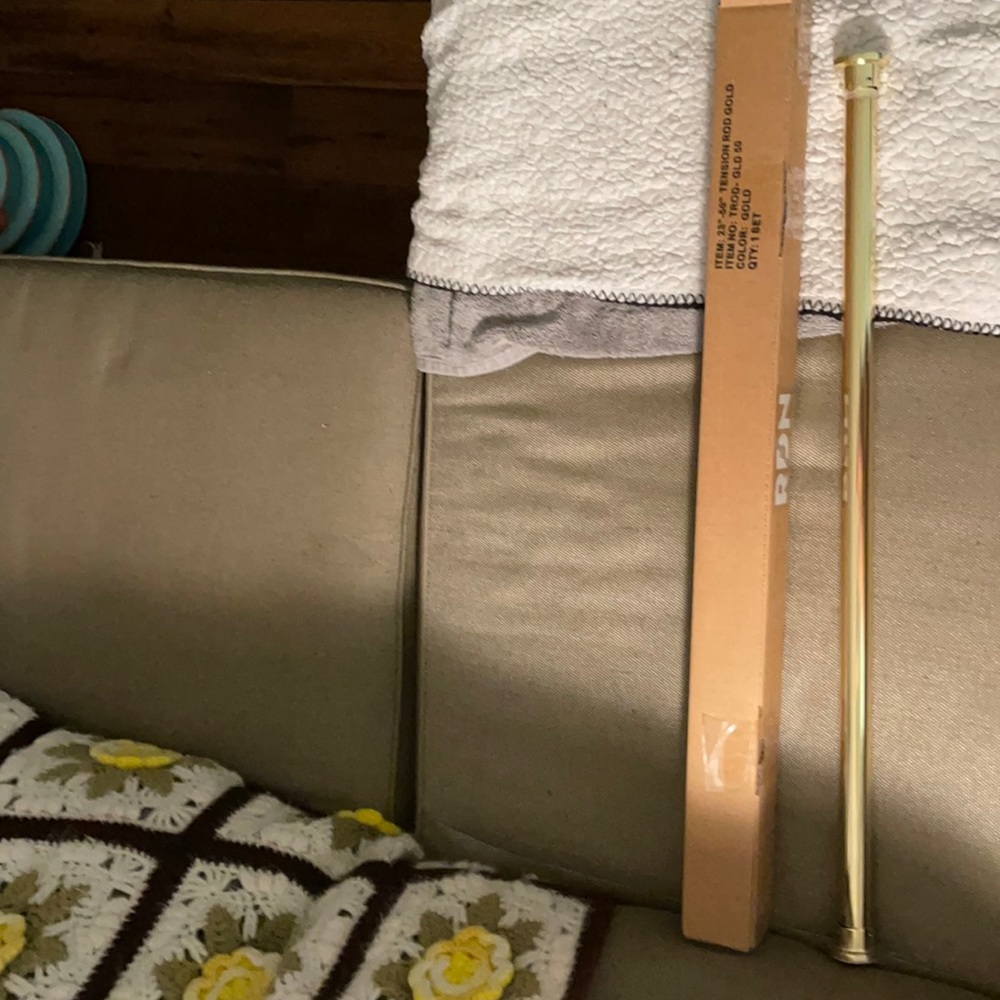 28”-50” gold tension curtain rod.